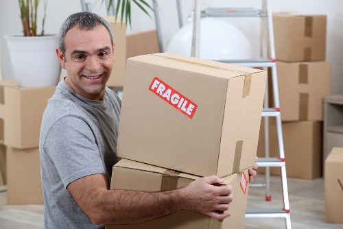 Removal team planning a local move in Grahame Park