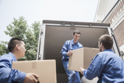 Local removals crew handling home items carefully