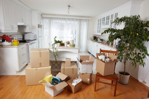 Packing and labelling items for an office relocation in Grahame Park