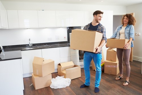 Family home relocation service with a moving van in Grahame Park