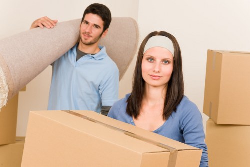 Commercial removals team relocating office equipment near Grahame Park