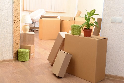 Loading furniture into a van for a local Grahame Park removal