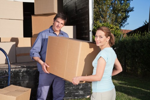 Business relocation with movers handling office equipment
